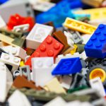 Heap of color plastic toy bricks